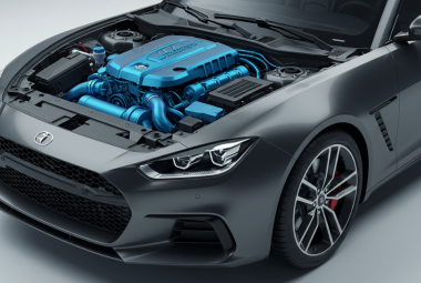 Modern car featuring highlighted 3D printed automotive parts.