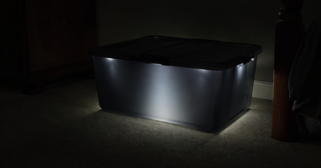 Sealed plastic filament container placed in a dark environment to reduce moisture exposure and protect filament quality